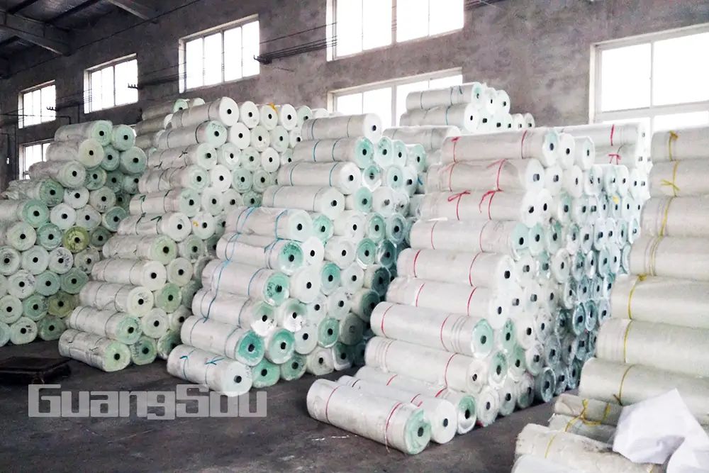 Fiberglass mesh rolls stored in the WGEBU warehouse